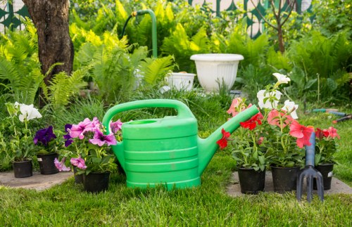 Heston gardeners shaping hedges and maintaining plants